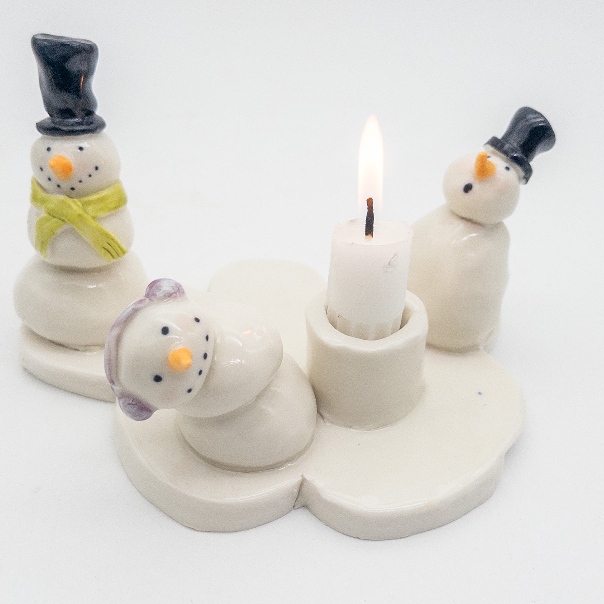 Lysestage med snemænd