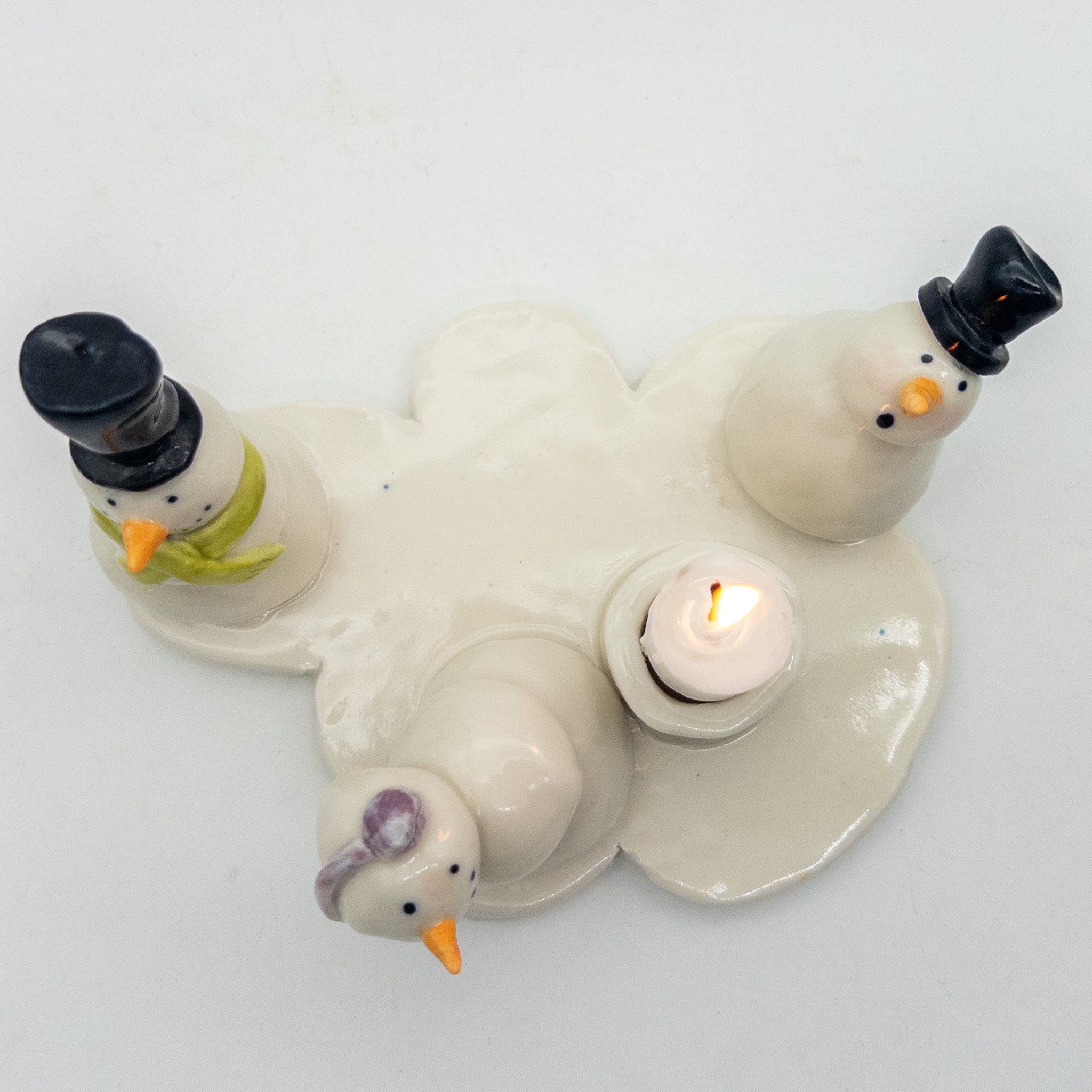 Lysestage med snemænd