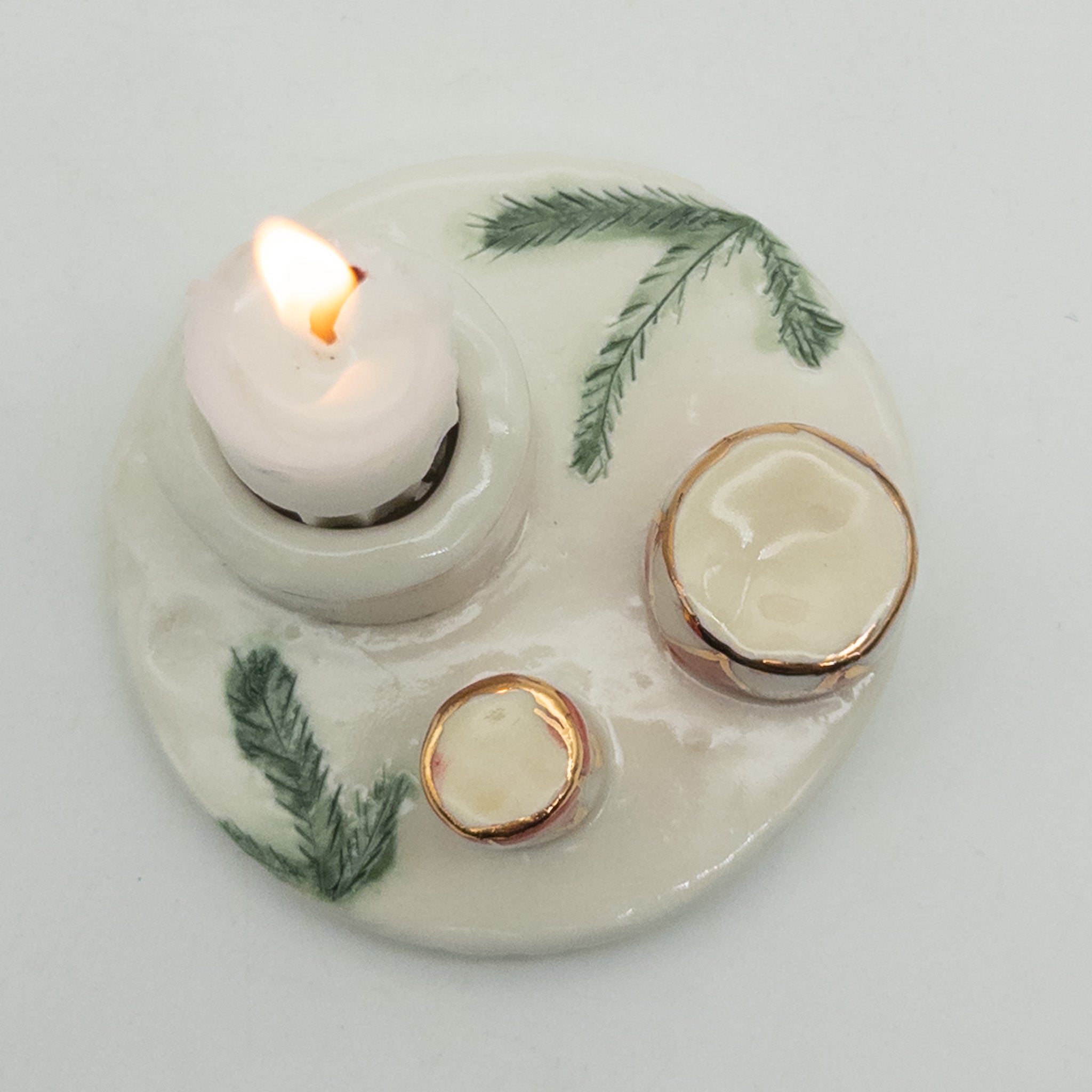 Lysestage med juletrommer