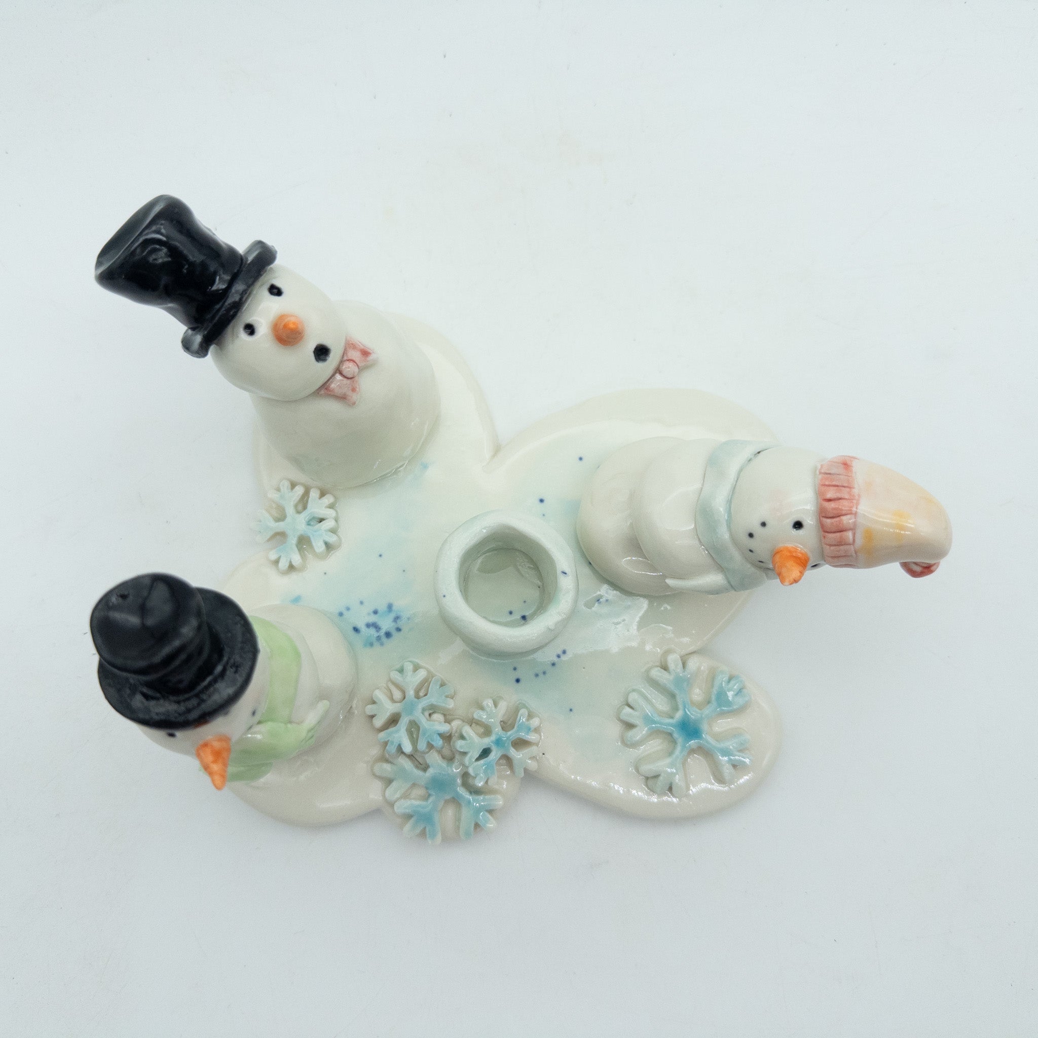 Lysestage med snemænd