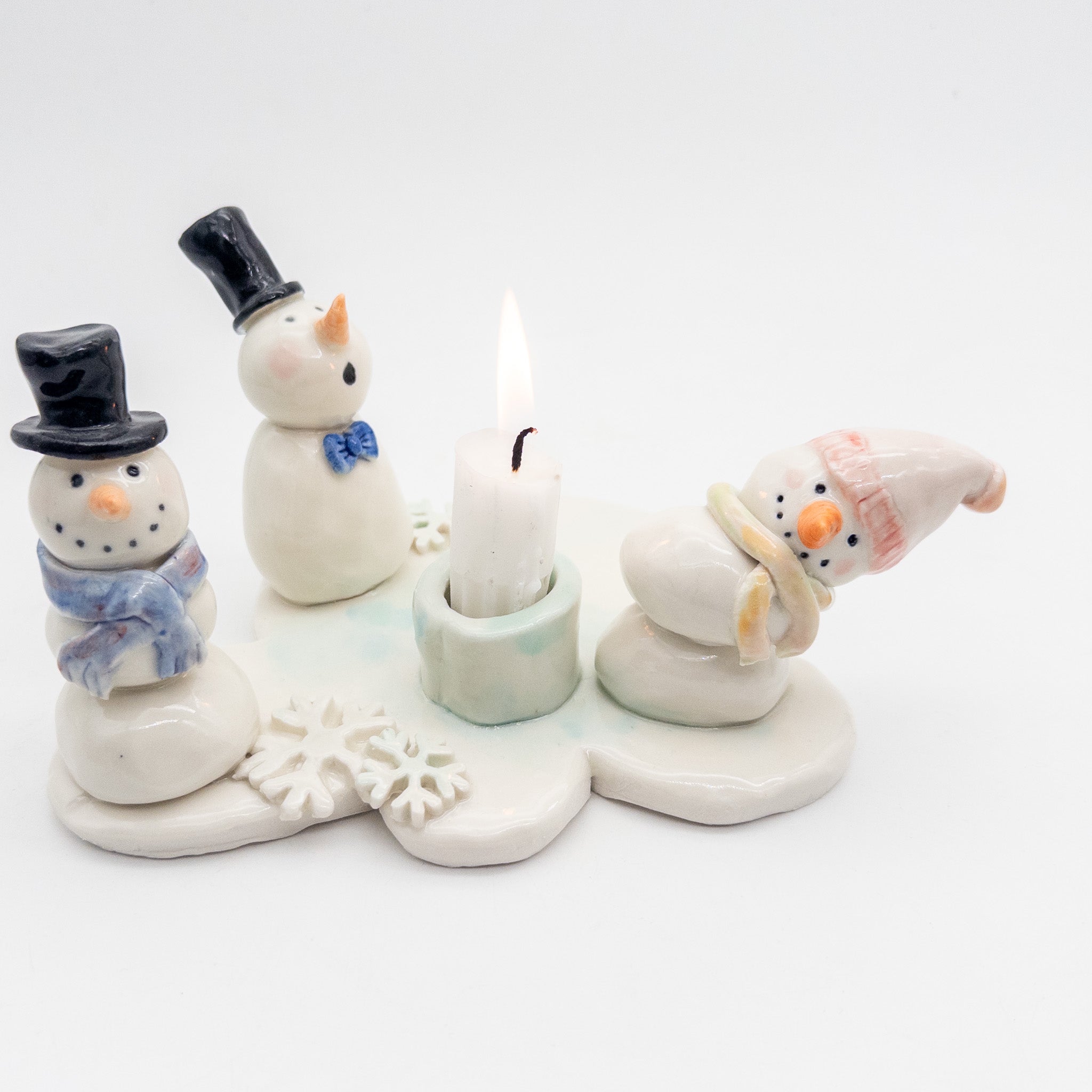 Lysestage med snemænd