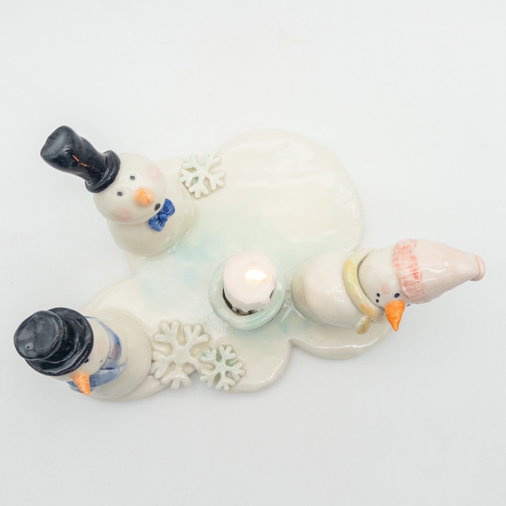 Lysestage med snemænd