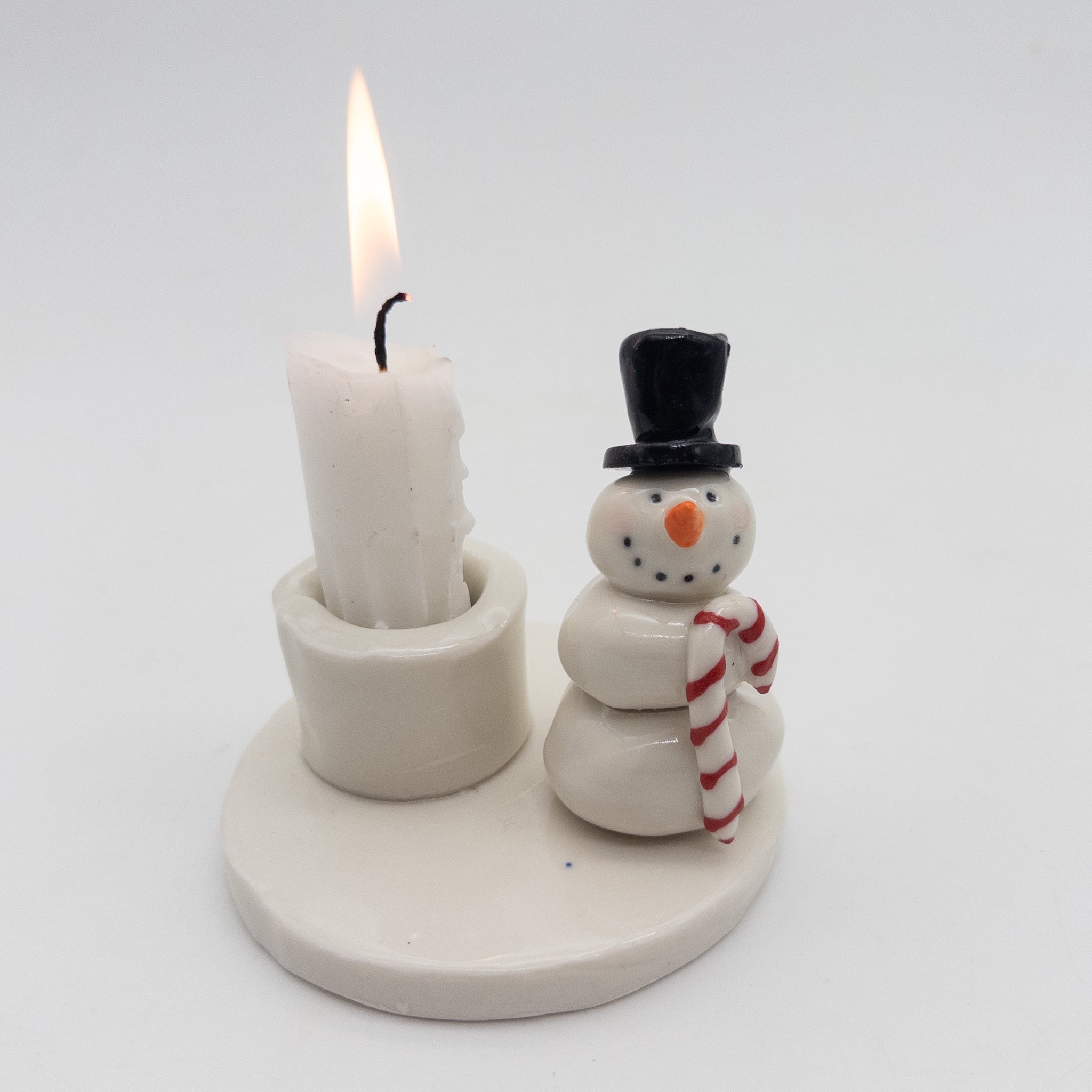 Lysestage med snemand